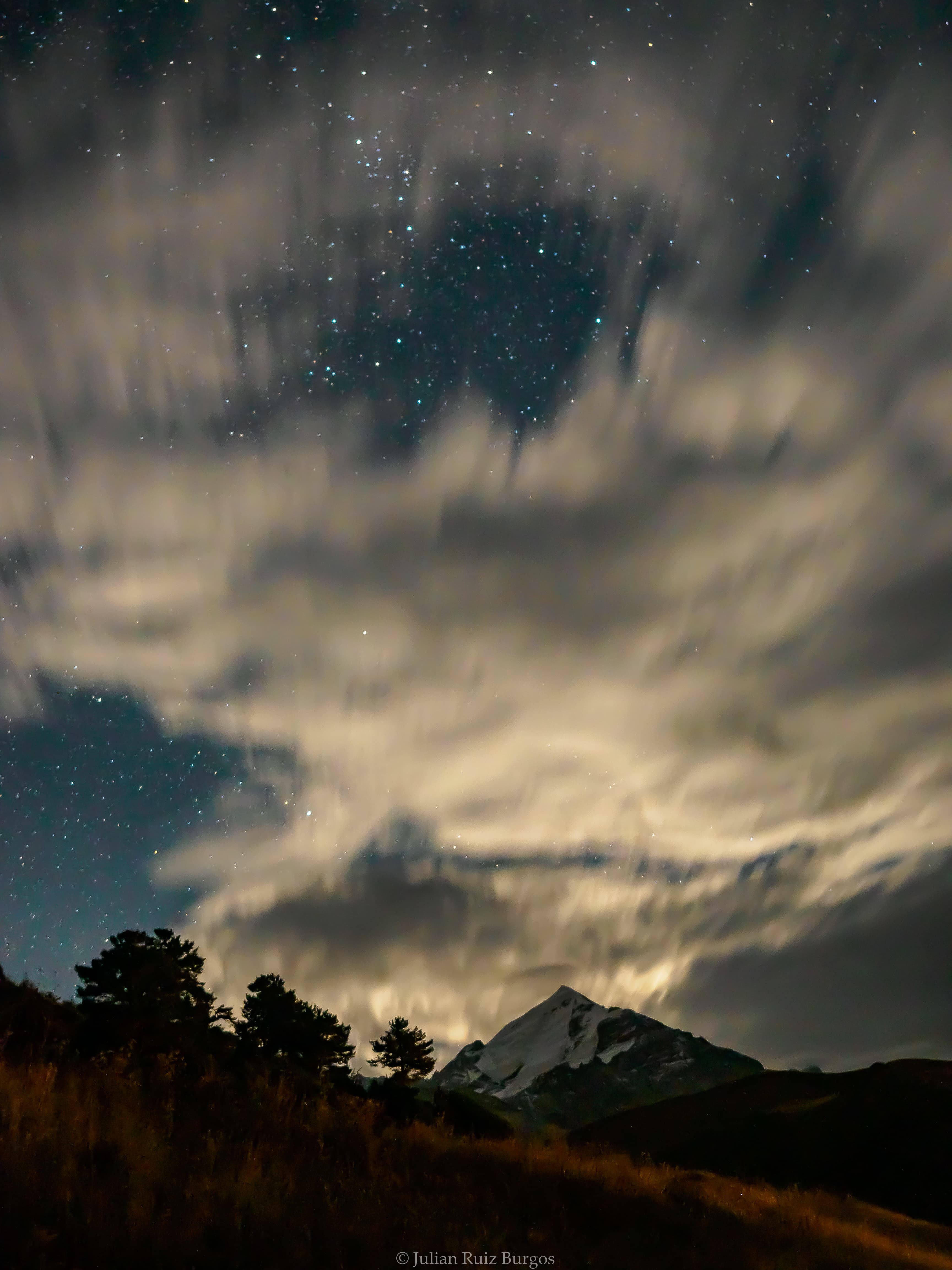 Starfield Breaking Through Storm Clouds