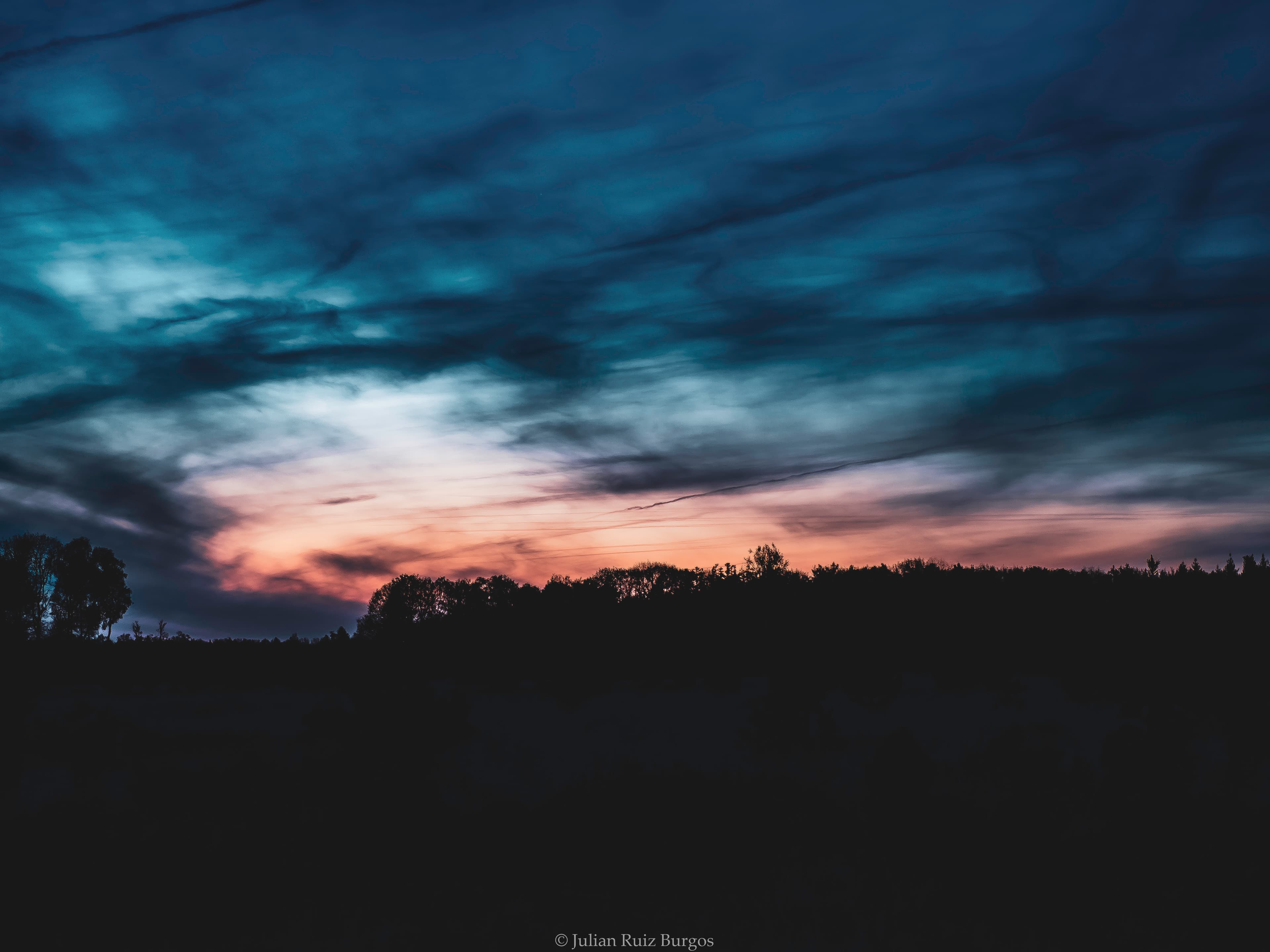 Dusk Breaks Through Turbulent Skies