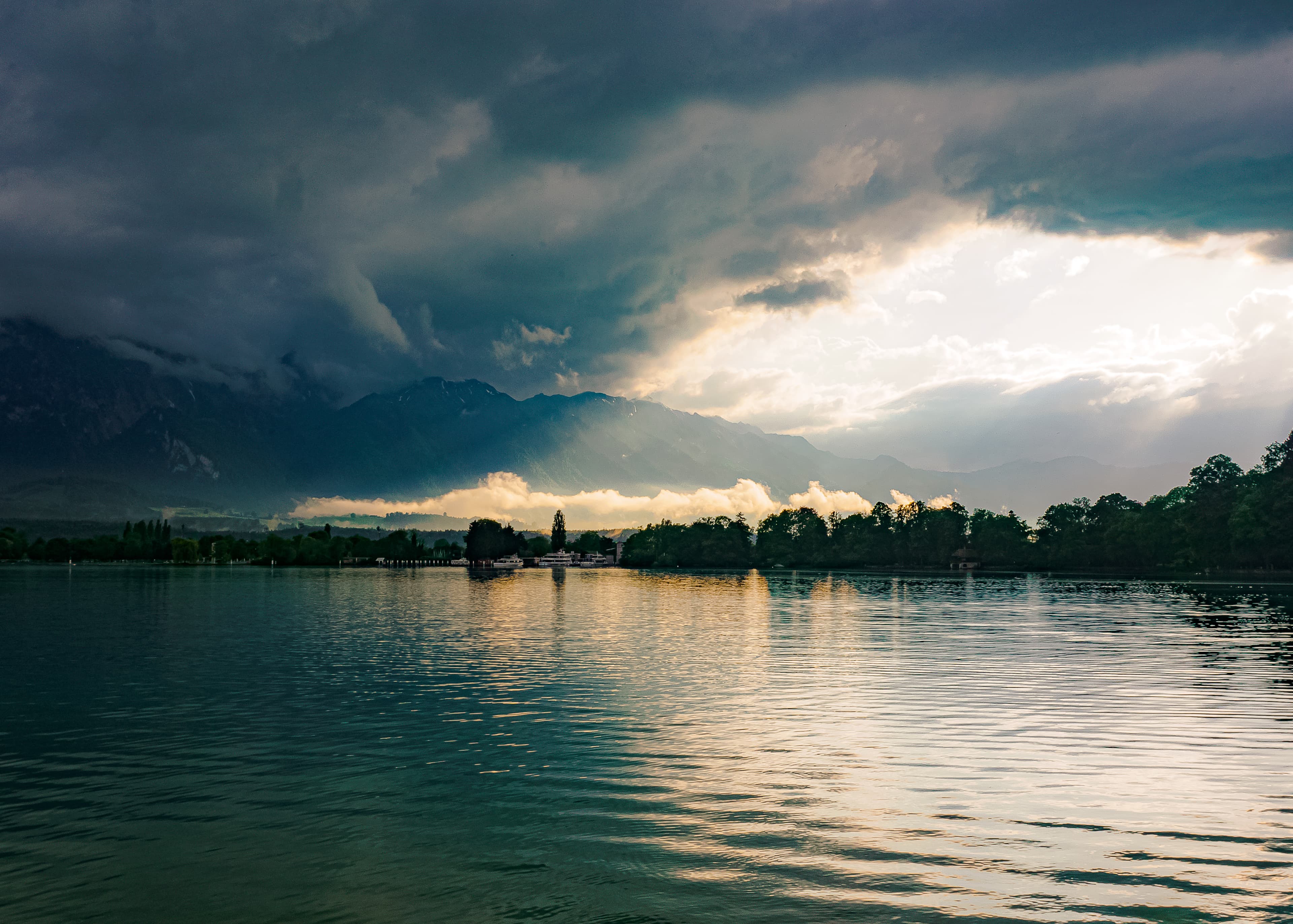Storm Light Over Alpine Lake