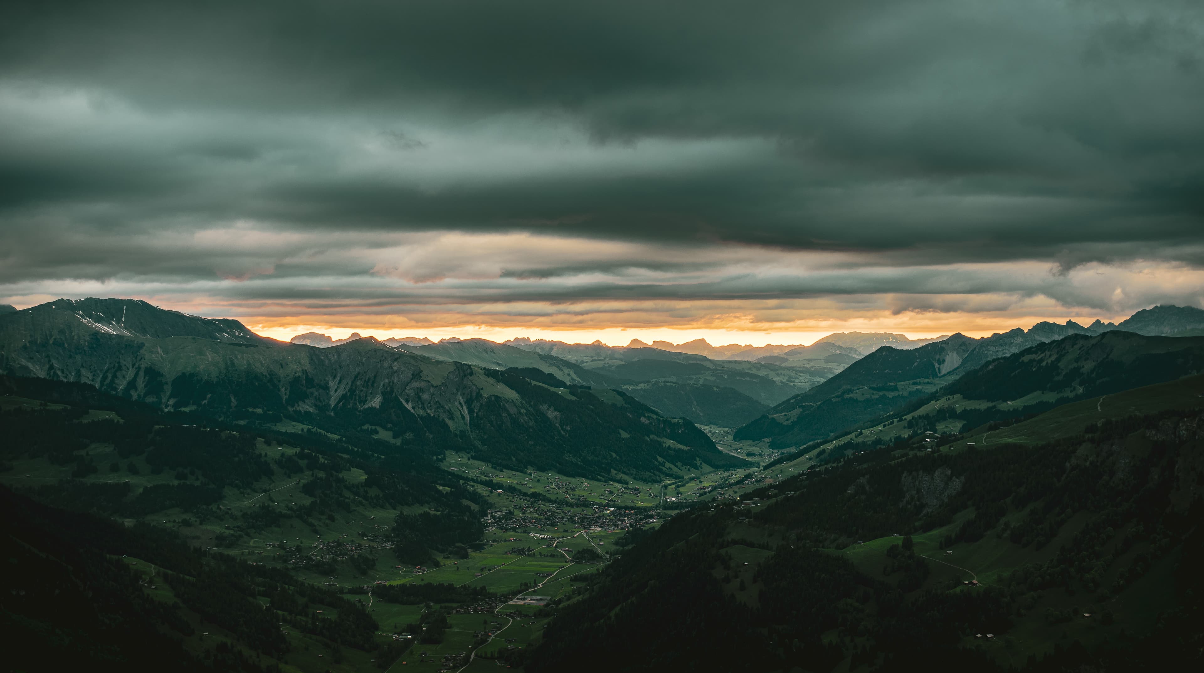 Storm Light Over an Alpine Valley