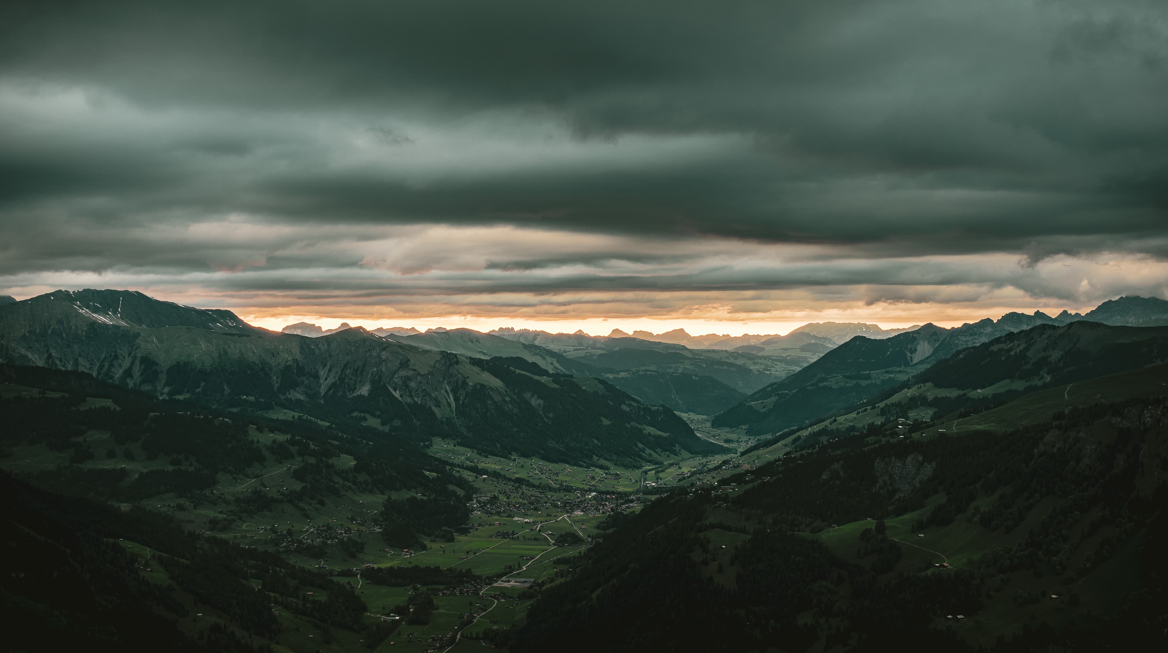 Storm Light Over an Alpine Valley