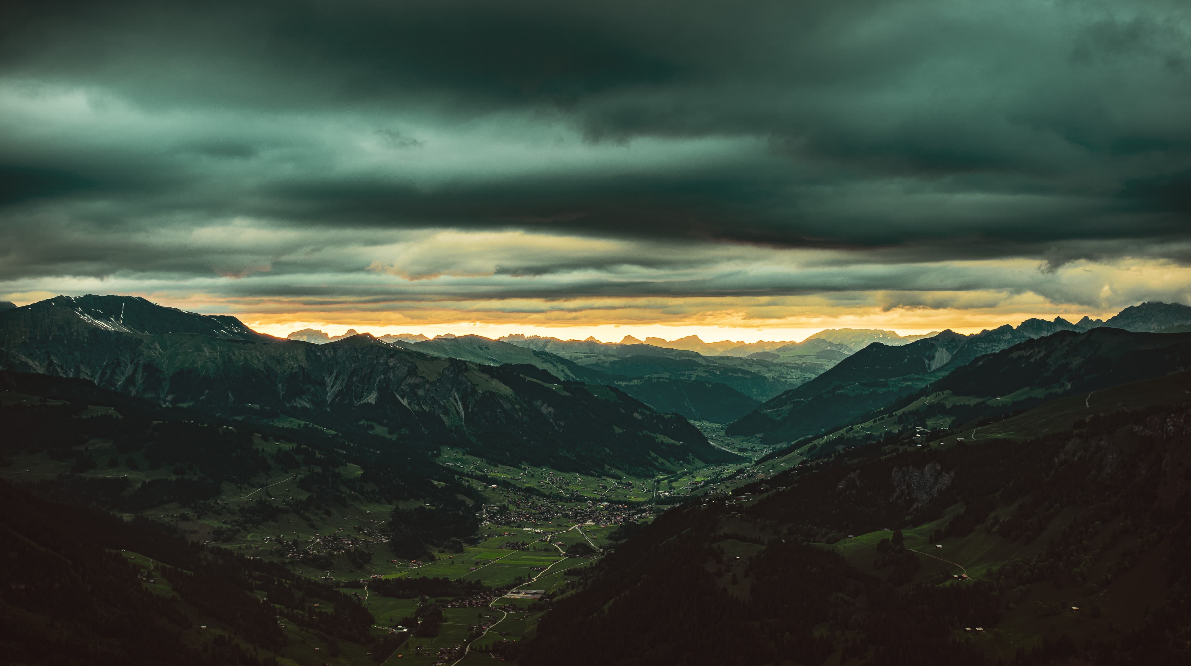 Storm Light Over the Alpine Valley