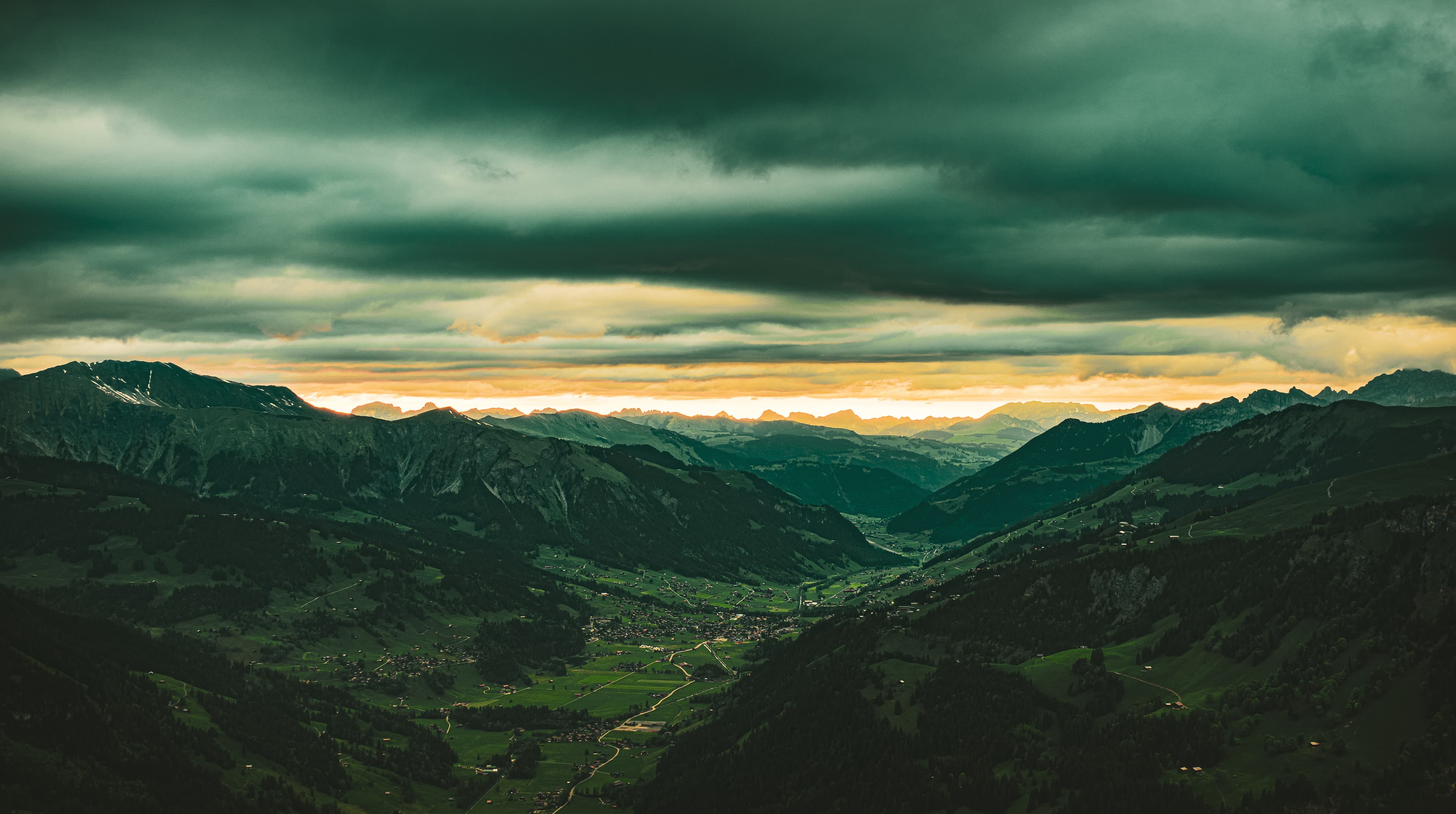 Storm Light Over an Alpine Valley