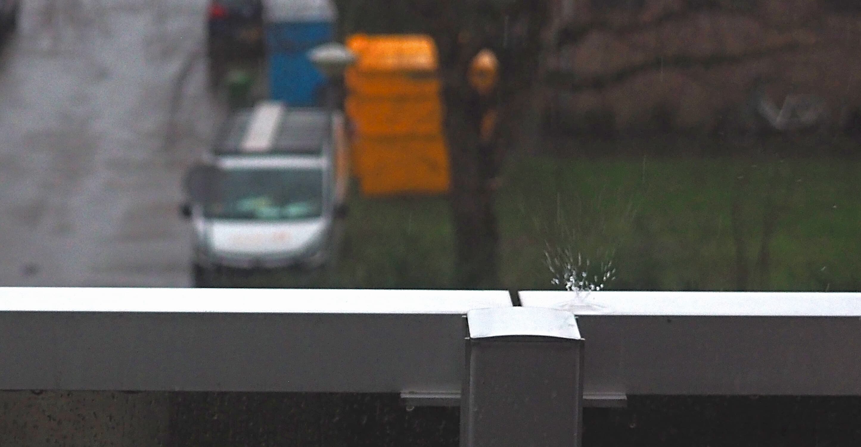 Rain Splash on Urban Railing